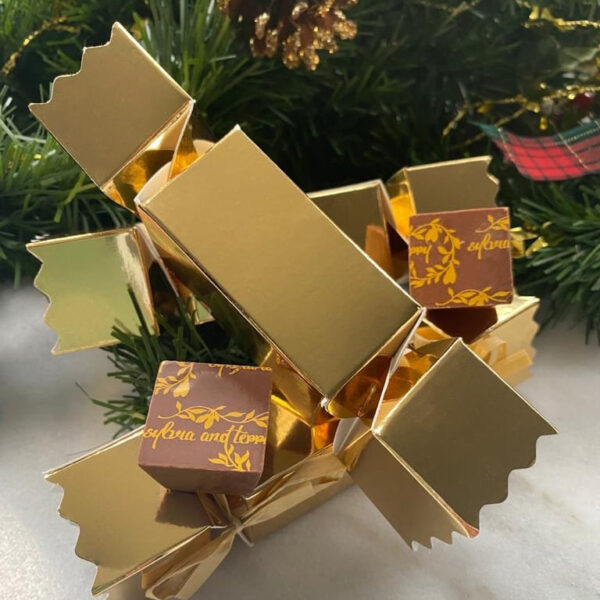 Our Bright Gold Small Twist-end cracker filled with personalised artisan chocolate truffles