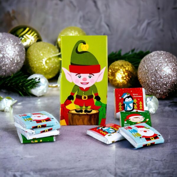 Elf Mini A-frame Carton in a festive scene with selection of chocolate Neapolitans